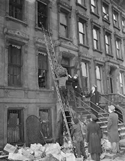 Policemen Removing a Body from a House