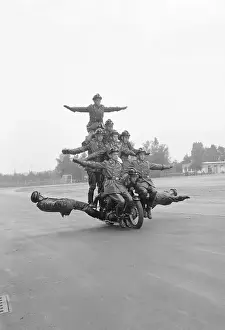 Balancing Prints: Twelve Policemen Riding One Motorcycle