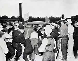 Policemen Tussle With Pickets