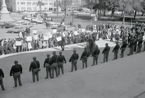 Columbia Prints: Policemen Watching Demonstrators