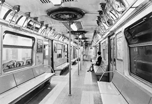 Policewoman in Subway Car Alone