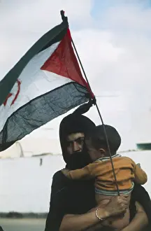 Polisario Member Holding Her Child