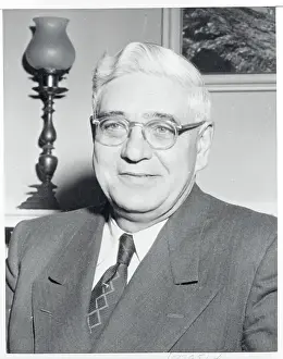 Politician Henry C. Dworshak Sitting by Lamp