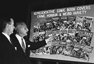 Politicians Observing and Discussing Display of Comic Books