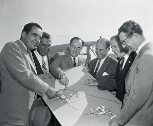US Politicians Studying Map