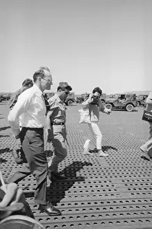 Politicians Walking on U. S. Base
