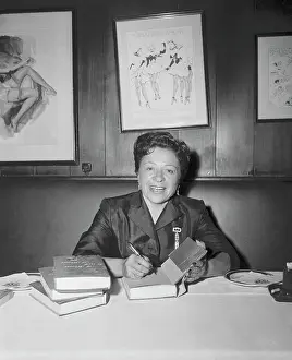 Polly Adler Signing one of Her Books