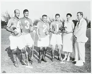 Polo Players Receiving Trophy