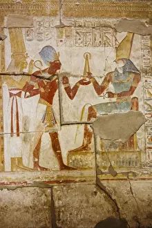 Polychromatic hieroglyphic showing The god Horus and Pharaoh Seti I at Abydos