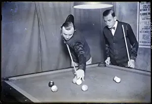 Billiards Prints: Pool Player Looks On While Shoots