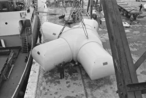 Portable House Structure Being Placed on Ship