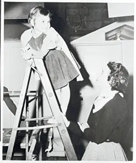 Portland Mason Climbing a Ladder
