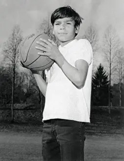 Portrait of American Indian Boy with Basketball