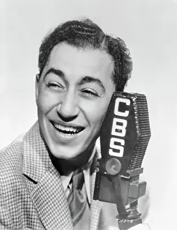 Portrait of Band Leader Louis Prima Near CBS Microphone