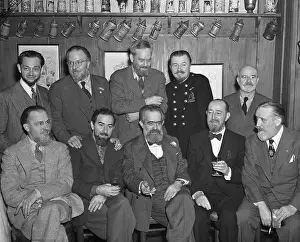 Portrait of Bearded Men Sitting Together