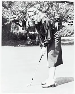 Monterey County Prints: Portrait of Bette Davis Playing Golf