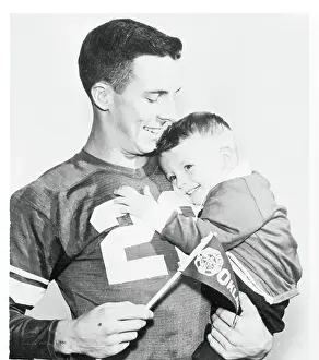 Portrait of Buddy Leake Holding Son Pat