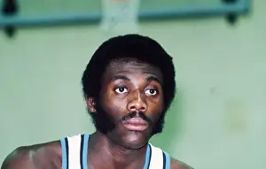 Prints of 1974- Close-up of Bob McAdoo, basketball player for the Buffalo Braves in his uniform. Undated color slide Hoops Through Time: A Visual Journey of Basketball History: Portrait of Buffalo Braves Player Bob McAdoo