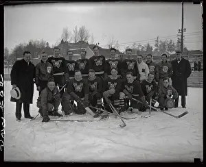 Prints of (Original Caption). This photo shows the Canadian Hockey team which competed in the Winter Olympics on February 4, 1932 Frozen Moments: A Journey Through Hockey History: Portrait of Canadian Olympic Hockey Team Posing Together