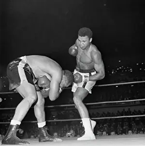 Portrait of Cassius Clay Boxing Archie Moore