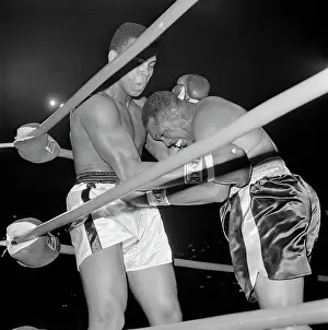 Portrait of Cassius Clay Boxing Archie Moore
