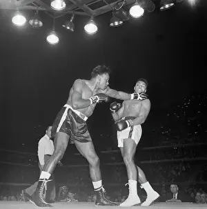Portrait of Cassius Clay Boxing Charlie Powell