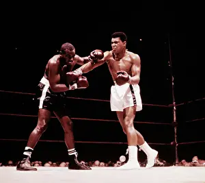 Portrait of Cassius Clay Hitting Doug Jones