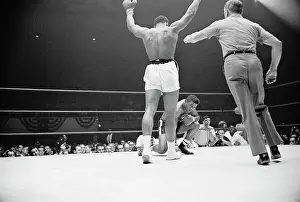Portrait of Cassius Clay Taunting Floyd Patterson