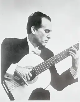 Portrait of Celedonio Romero Playing His Sorcery Driven Guitar