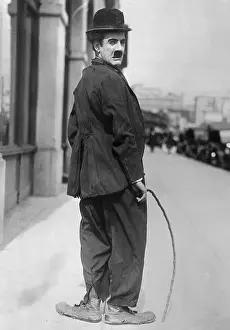 Prints of (Original Caption). Chaplin versus Aplin in the courts. Here's Charlie Aplin Amador, who is featured in comedy films, which, the original Chaplin claims, are a blight on his honorable career Master of Mime, Icon of Cinema: Chaplin in Prints: Portrait of Charlie Aplin Amador