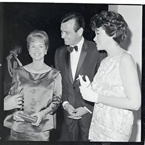 Portrait of Debbie Reynolds, David Janssen and Mrs. Janssen
