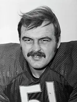 Portrait of Dick Butkus Wearing Football Jersey