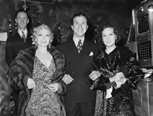 Portrait of Dick Powell With Colleagues