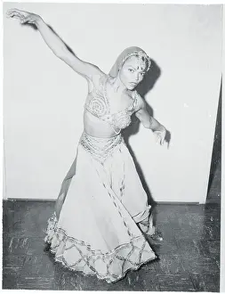Prints of (Original Caption). Costumed Eartha Kitt, who will star as Salome in a television production Dec. 18, rehearses for the role. The popular songstress will forget singing to dance and act in this part Captivating Art Prints Celebrating the Iconic Performer’s Legacy: Portrait of Eartha Kitt