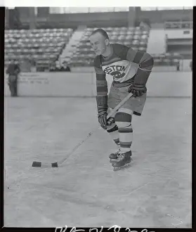 Prints of (Original Caption). Eddie Shore, player for the Boston Bruins Frozen Moments: A Journey Through Hockey History: Portrait of Eddie Shore Playing Hockey