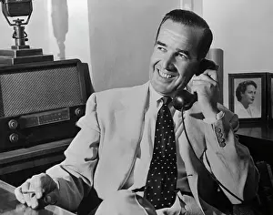 Edward R Prints: Portrait of Edward Murrow Talking on Phone