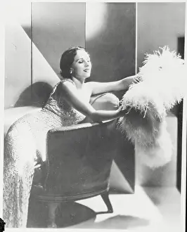 Portrait of English Actress Benita Hume Posing on Chair