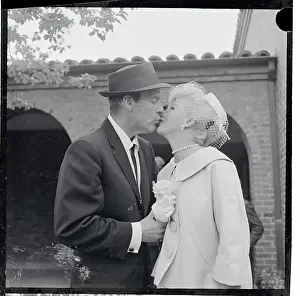 Portrait of Ginger Rogers Kissing William Marshall