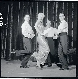 Portrait of Ginger Rogers and Male Dancers