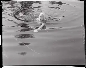 Portrait of Ginger Rogers Swimming