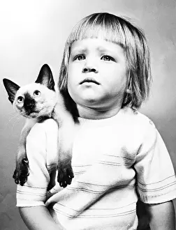 Sling Prints: Portrait of Girl With Siamese Cat