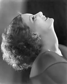 Prints of (Original Caption). Portrait of actress Greta Garbo (1905-1990) leaning her head back Timeless Elegance: The Iconic Greta Garbo Collection: Portrait of Greta Garbo