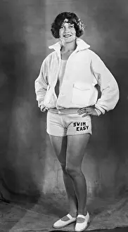 Shorts Prints: Portrait of happy young woman in sport outfit
