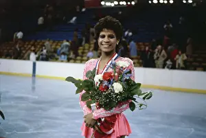 Portrait of Ice Skating Champion Debi Thomas with Bouquet