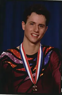 Portrait of iIe Skater Brian Boitano Posing with His Medal