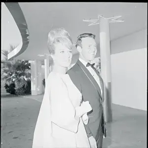 Prints of (Original Caption). Inga Stevens and husband arrive at Emmy Presentations At The Movies: Portrait of Inga Stevens and Husband