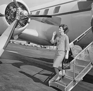 Portrait of Jackie Kennedy Leaving Plane