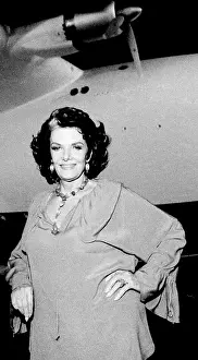 Prints of Portrait of American actress and sex symbol Jane Russell (1921 - 2011) as she poses in front of Howard Hughes H-4 Hercules flying boat, popularly known as the Spruce Goose, Long Beach, California Hollywood's Sultry Siren – A Photographic Tribute: Portrait Of Jane Russell & The Spruce Goose