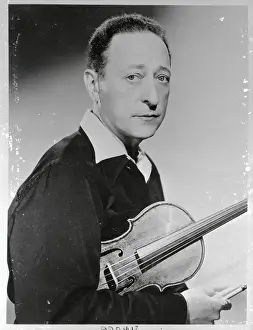 Portrait of Jascha Heifitz Holding Violin