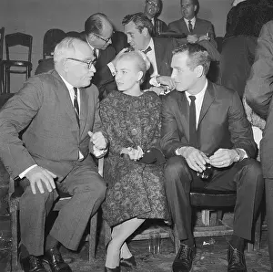 Prints of (Original Caption) Timeless Charm: A Visual Journey through the lens: Portrait of Joanne Woodward, Paul Newman and Thornton Wilder